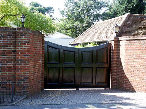 Double wooden driveway gates